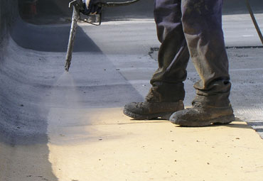 Coating systems over Manchester spray foam roof systems